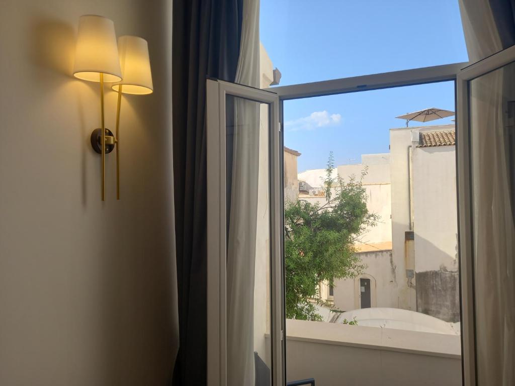 Fotografie z fotogalerie ubytování Lanterne Magiche Ortigia Suites v destinaci Siracusa