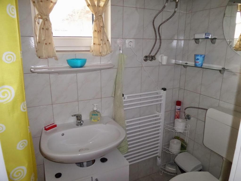 Ванна кімната в Tiszavirág Vendégház