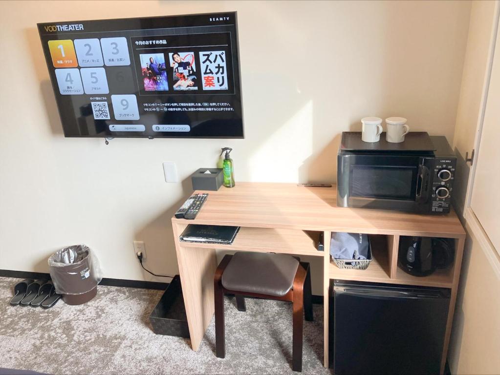Kuchyň nebo kuchyňský kout v ubytování HOTEL LiVEMAX BUDGET Sagamihara
