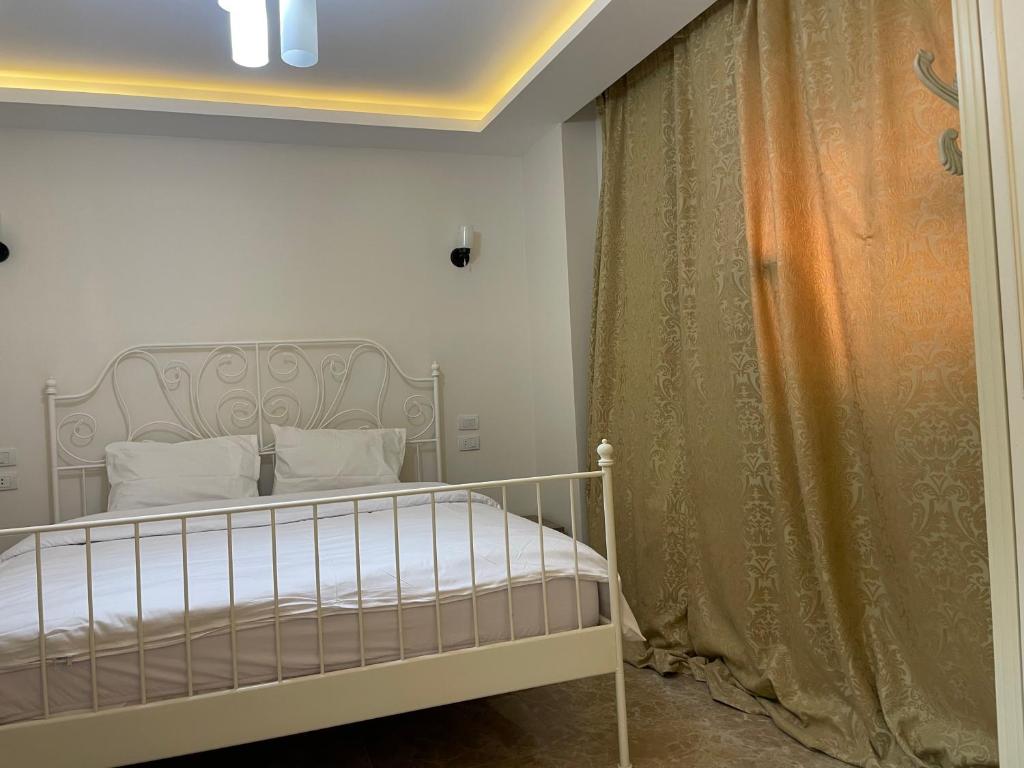 Postel nebo postele na pokoji v ubytování شقة فندقية عائلية