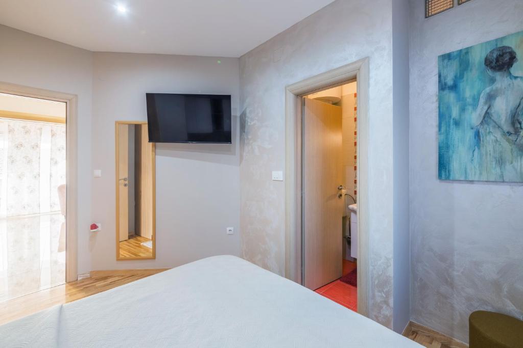 Televízia a/alebo spoločenská miestnosť v ubytovaní Turta apartment