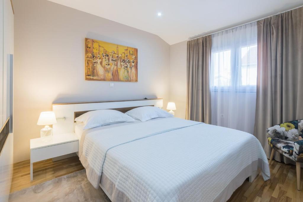 Posteľ alebo postele v izbe v ubytovaní Turta apartment
