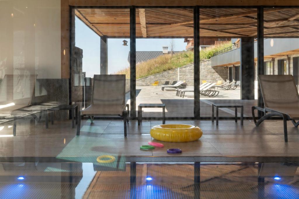 Posezení v ubytování MGM Hôtels & Résidences - Hôtel Alpen Lodge