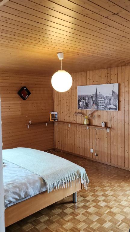 Postel nebo postele na pokoji v ubytování Ferienhaus Luzern