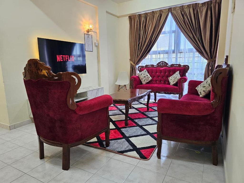 Televisyen dan/atau pusat hiburan di Sabari Families Homestay
