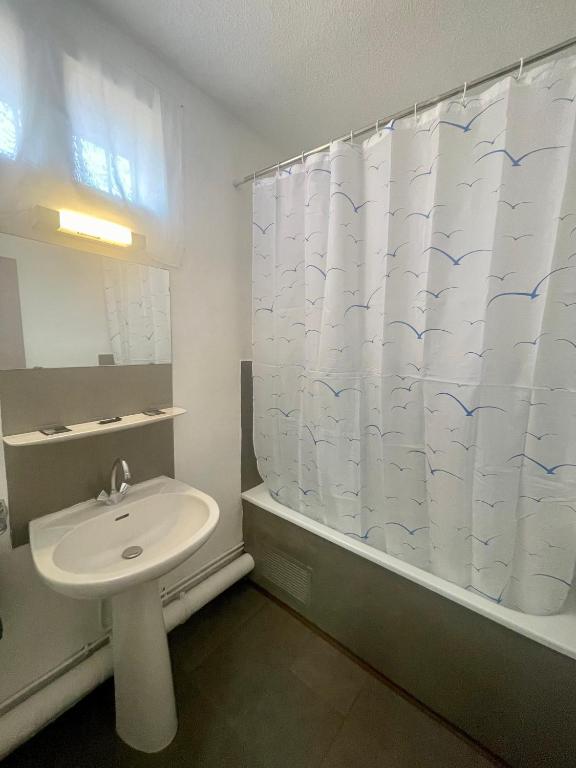 Koupelna v ubytování Hotel Alexander