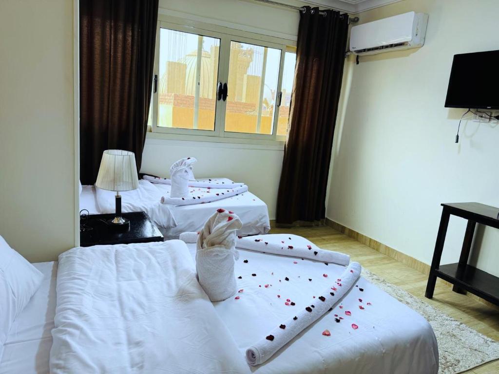 Katil atau katil-katil dalam bilik di Phoenix Pyramids View Inn