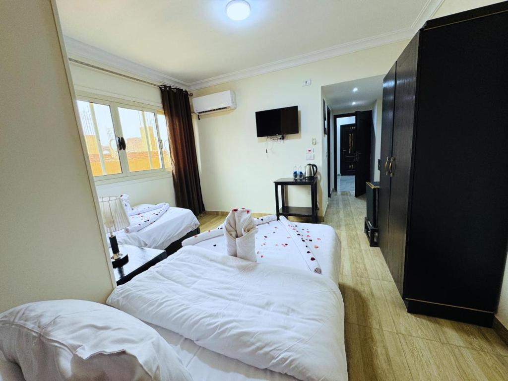 Katil atau katil-katil dalam bilik di Phoenix Pyramids View Inn