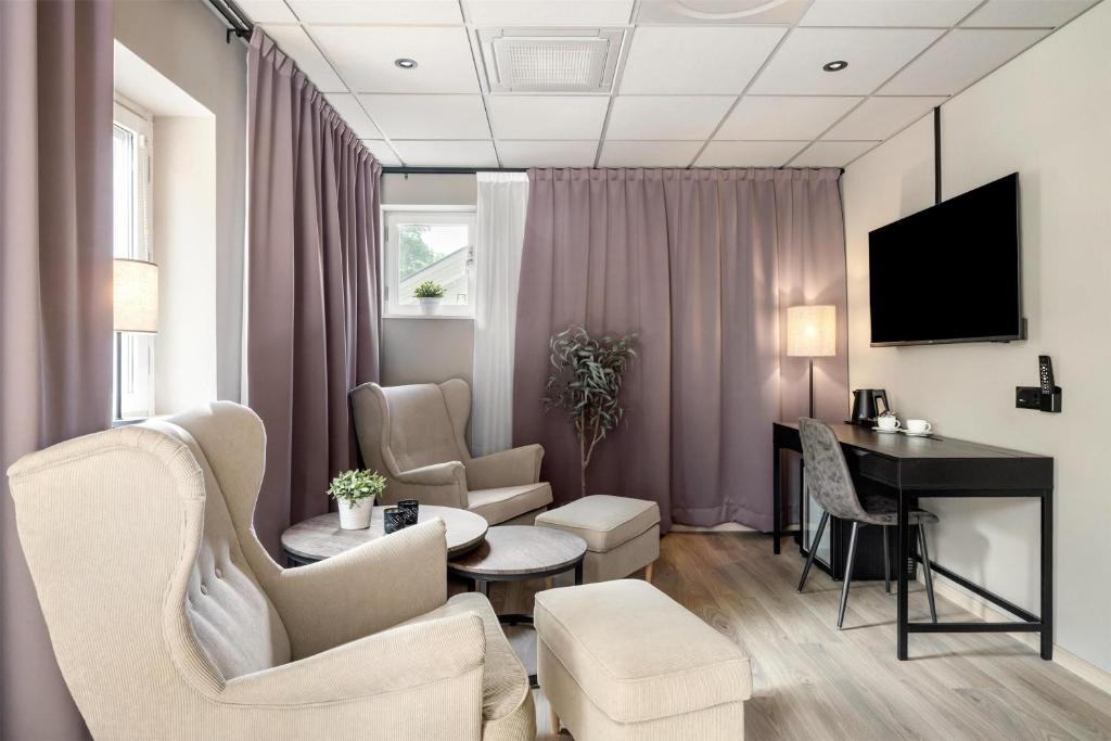 TV a/nebo společenská místnost v ubytování Best Western Hotel City Gavle