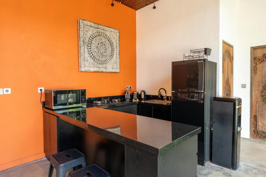 Dapur atau dapur kecil di Rouge - Loft Dimanisa