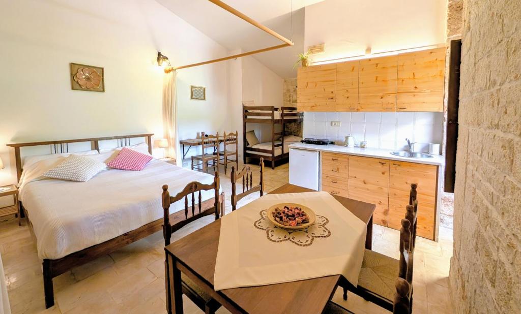 Llit o llits en una habitació de Trulli Panoramici