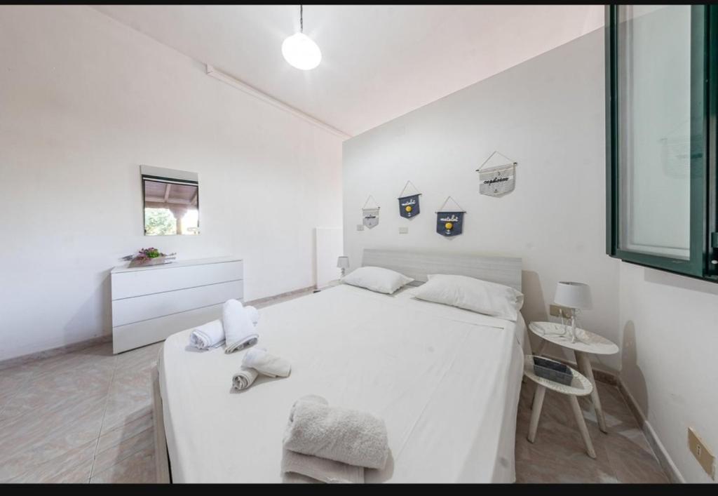 Letto o letti in una camera di Agriturismo l' Annunziata