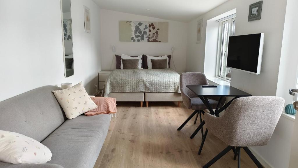 Posezení v ubytování Cozy Apartment Stevns