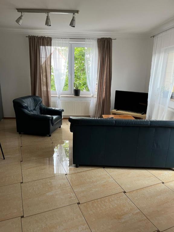 Televízia a/alebo spoločenská miestnosť v ubytovaní Apartament 150m2 SZCZYTNO Mazury City CENTER Lake View