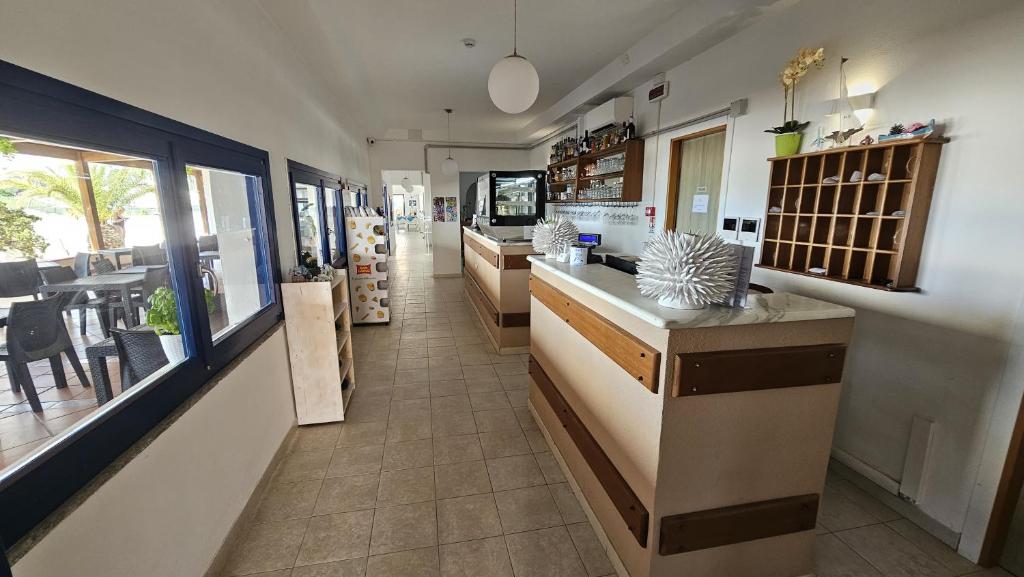 Una cocina o kitchenette en Vel Marì - Rooms on the Beach