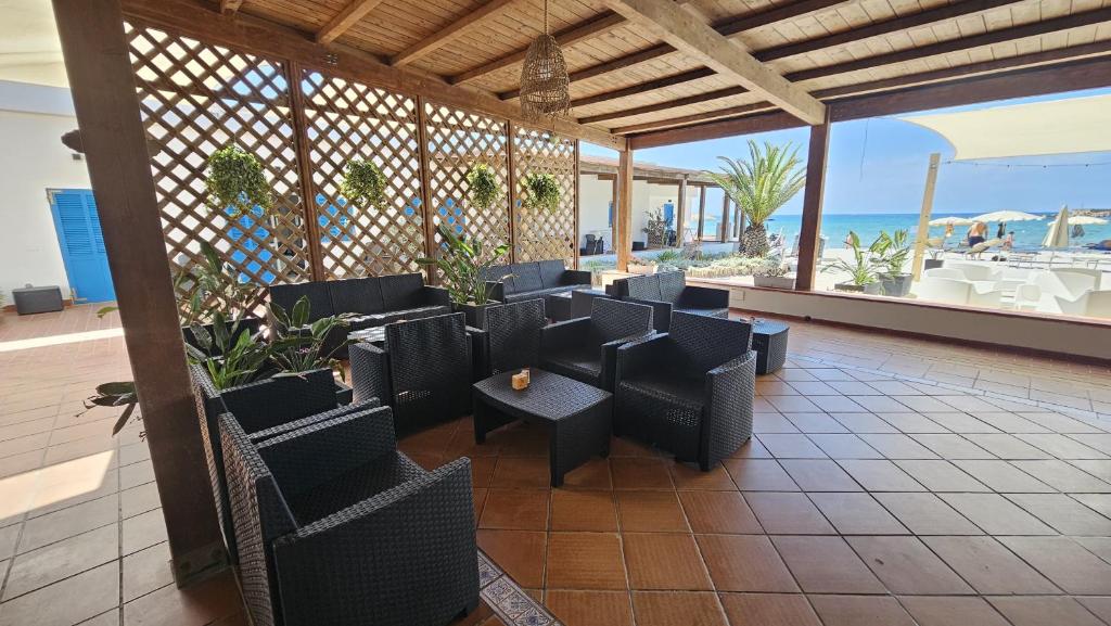 Un lugar para sentarse en Vel Marì - Rooms on the Beach