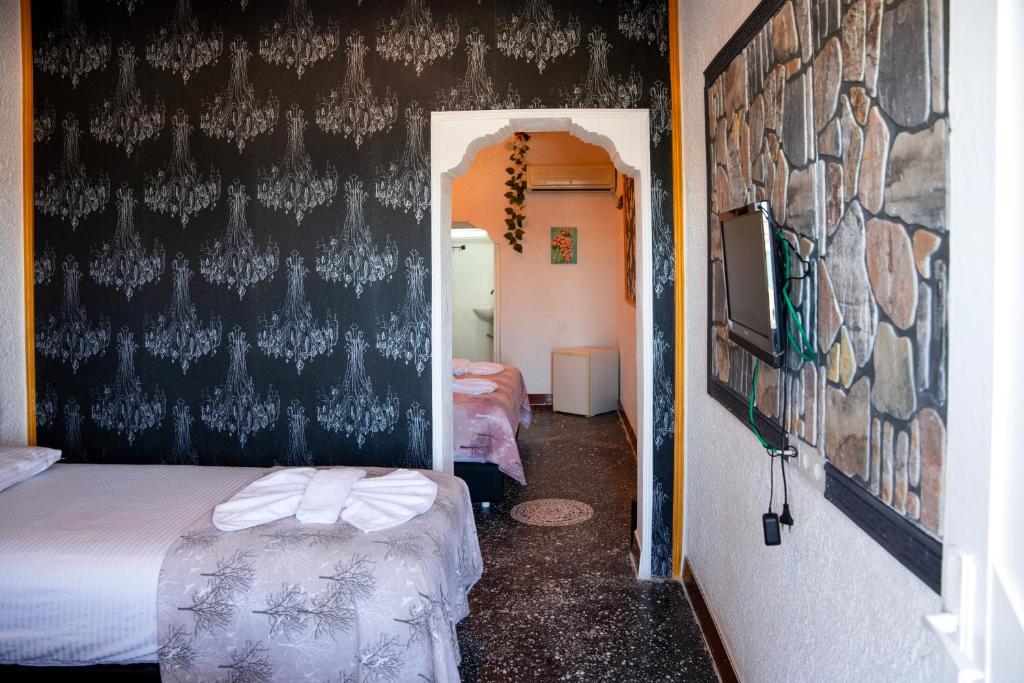Postel nebo postele na pokoji v ubytování İMREN'S OTEL