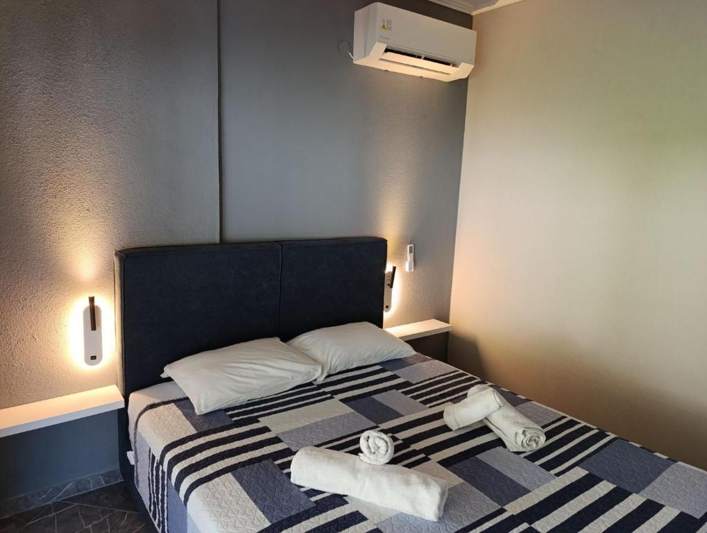 Postel nebo postele na pokoji v ubytování Sountou home