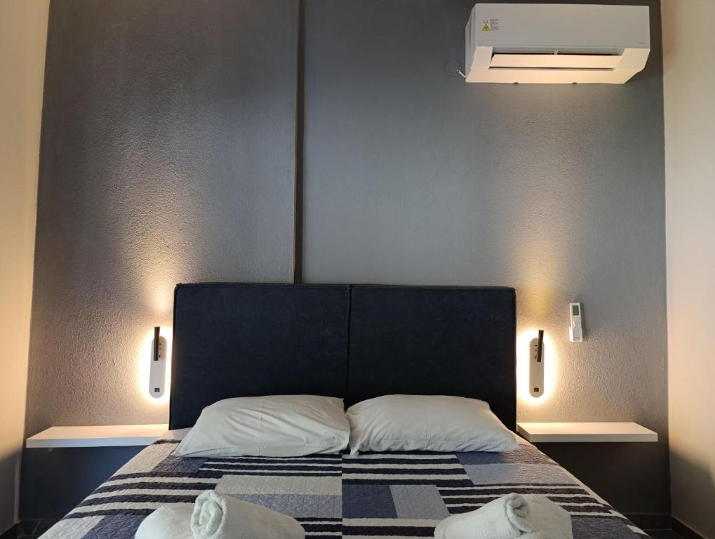 Postel nebo postele na pokoji v ubytování Sountou home