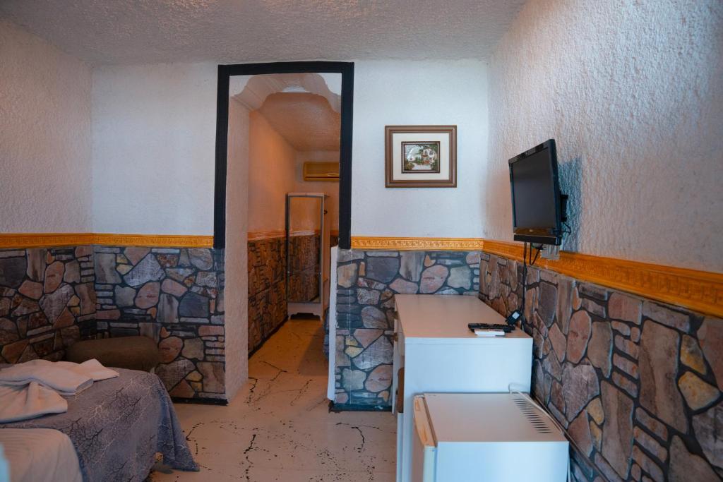 TV a/nebo společenská místnost v ubytování İMREN'S OTEL