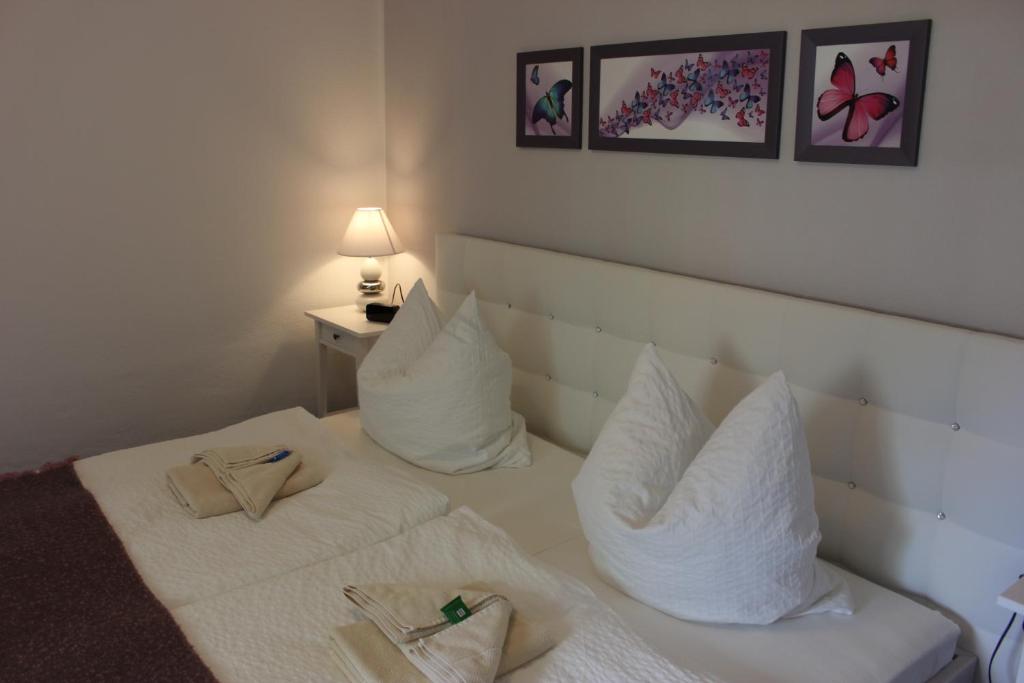 Postel nebo postele na pokoji v ubytování Weber Apartments