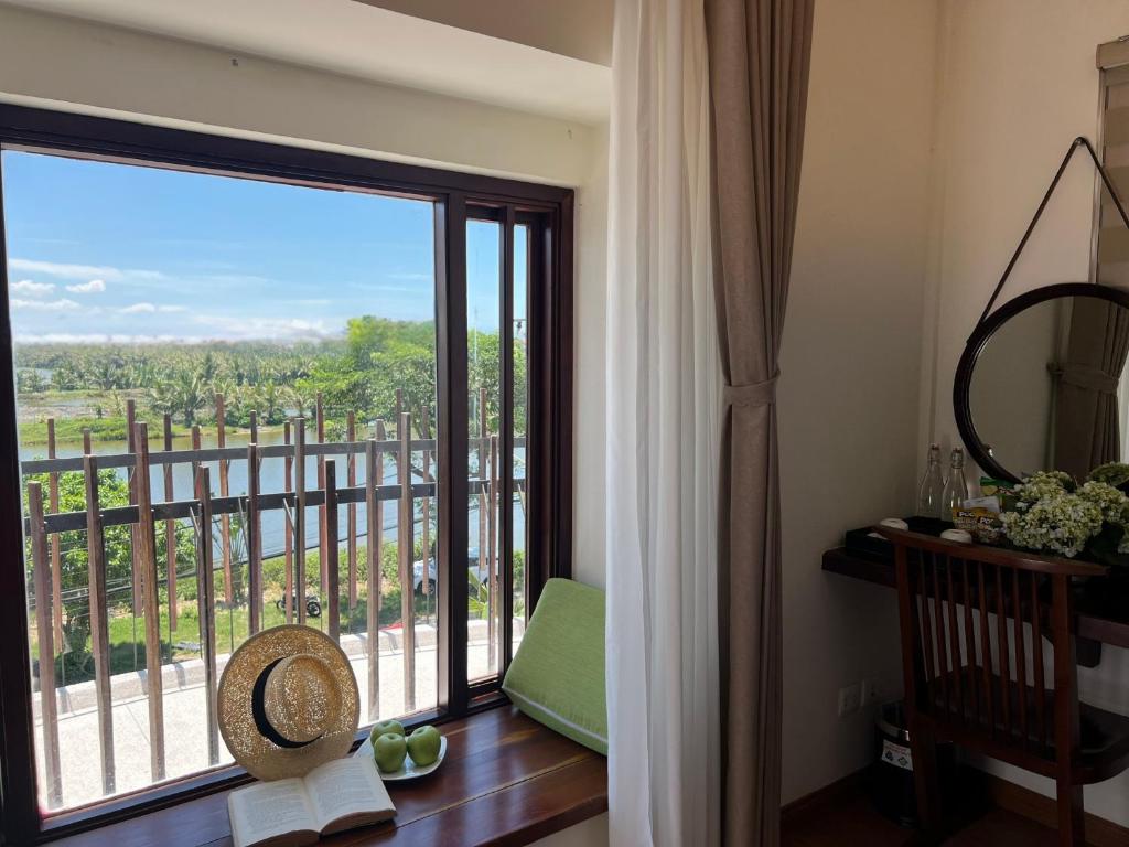 Balkón nebo terasa v ubytování Happy Life Memories Hoi An Hotel & Spa