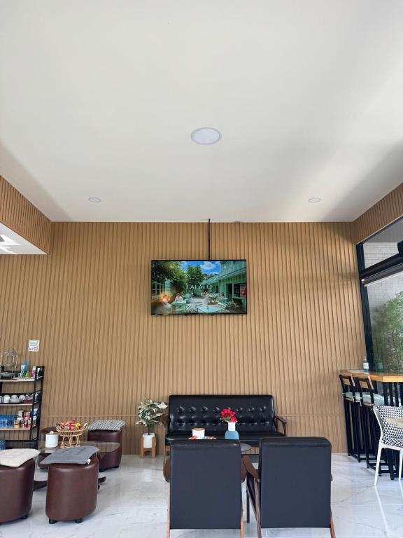 TV a/nebo společenská místnost v ubytování Maesai Bliss Residence