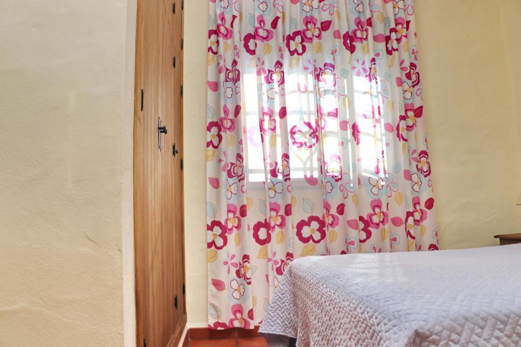 A bed or beds in a room at Chalet Bella Mendoza