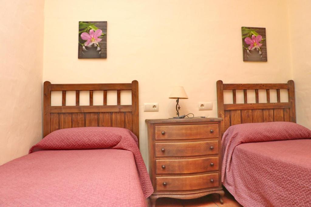 A bed or beds in a room at Chalet Bella Mendoza