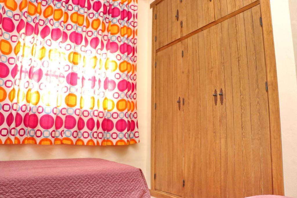 A bed or beds in a room at Chalet Bella Mendoza
