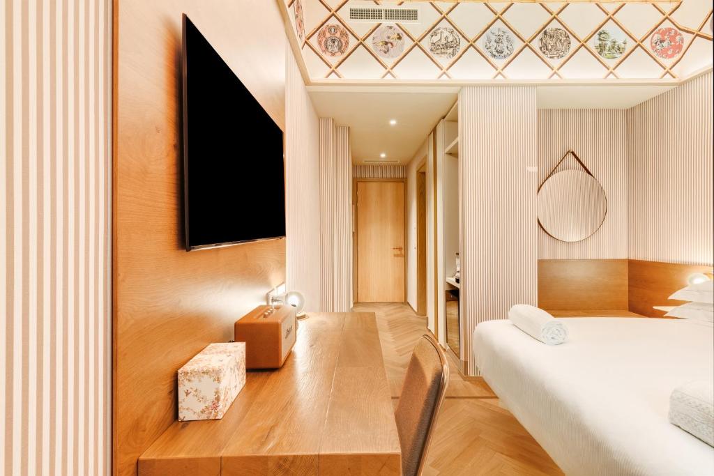 Postel nebo postele na pokoji v ubytování QC room Milano Porta Romana