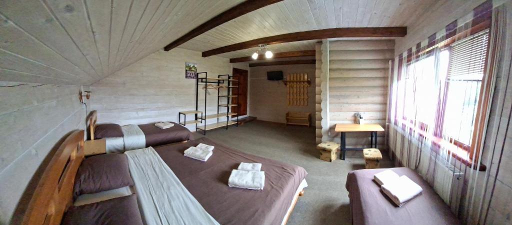 Postel nebo postele na pokoji v ubytování Lucy