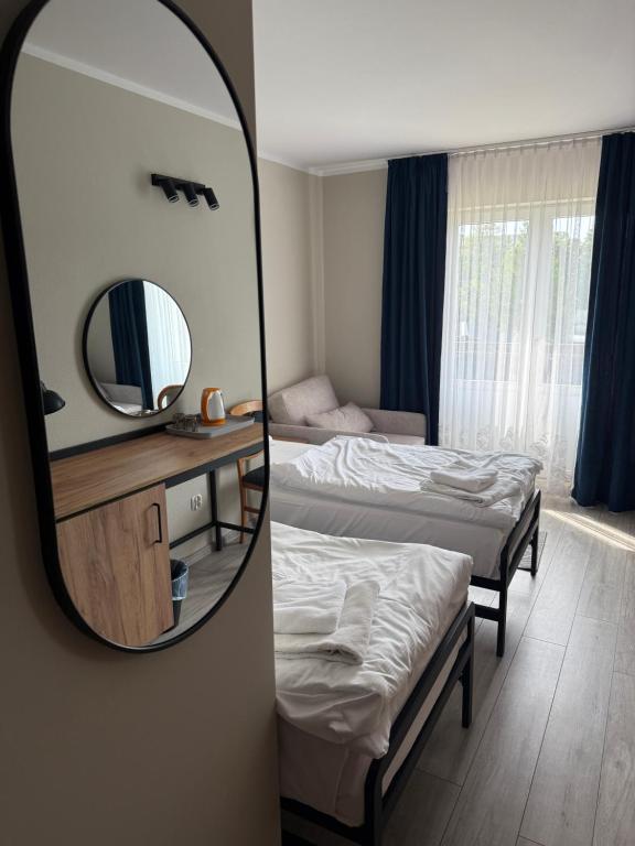Postel nebo postele na pokoji v ubytování Hotel Kliper