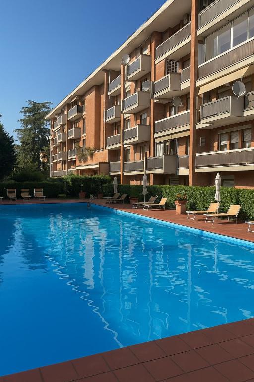 a large swimming pool in front of a building at Terrace! in Rome