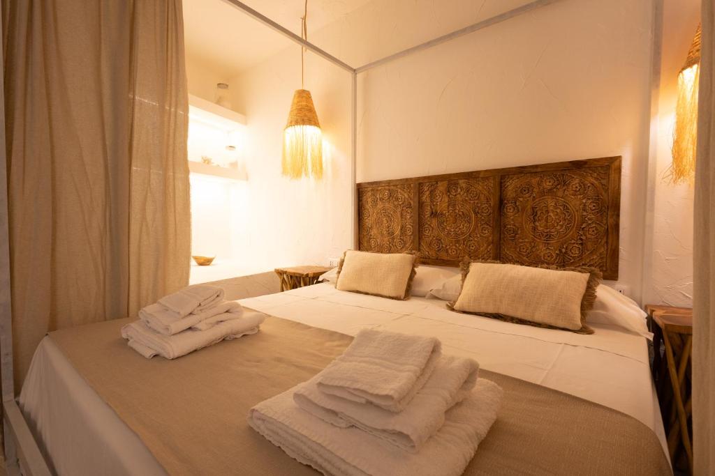 Postel nebo postele na pokoji v ubytování Rada room&suite