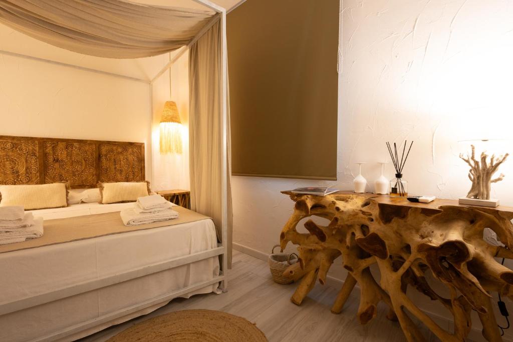 Postel nebo postele na pokoji v ubytování Rada room&suite