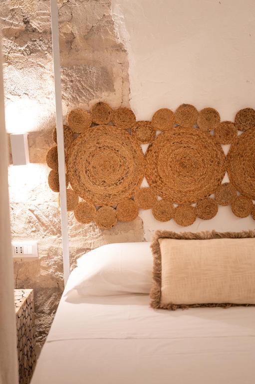 Postel nebo postele na pokoji v ubytování Rada room&suite