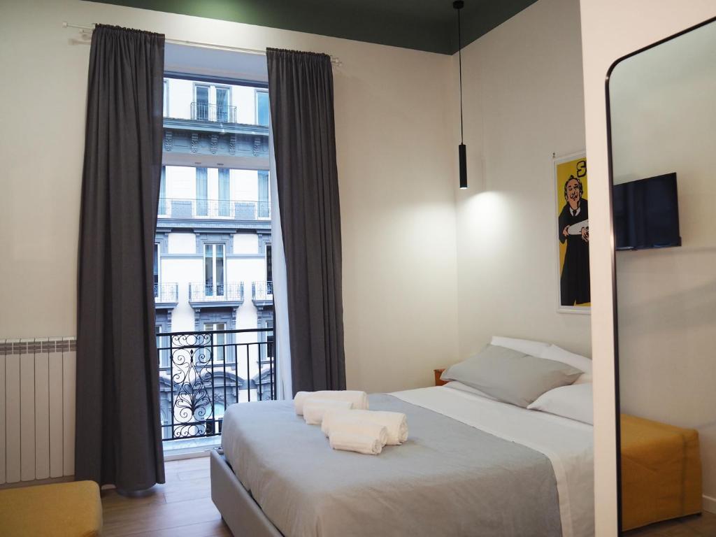 Ένα ή περισσότερα κρεβάτια σε δωμάτιο στο Plan B B&B