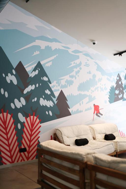 Postel nebo postele na pokoji v ubytování KY Mountain Hostel Arinsal