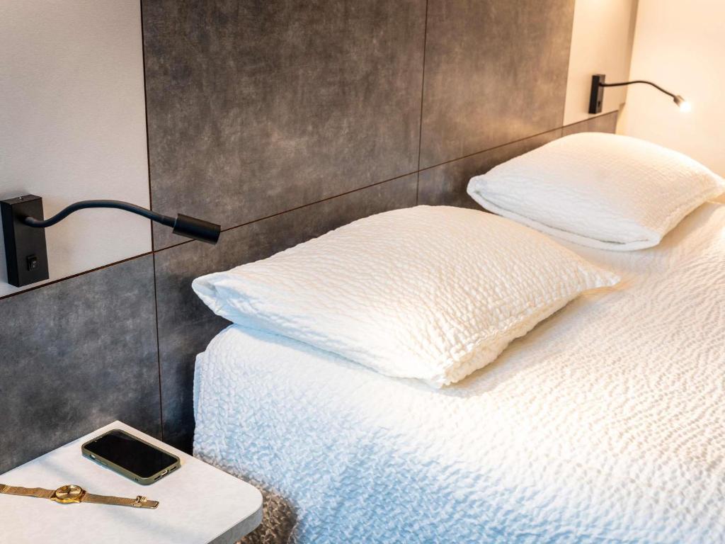 Postel nebo postele na pokoji v ubytování ibis styles Brive Ouest