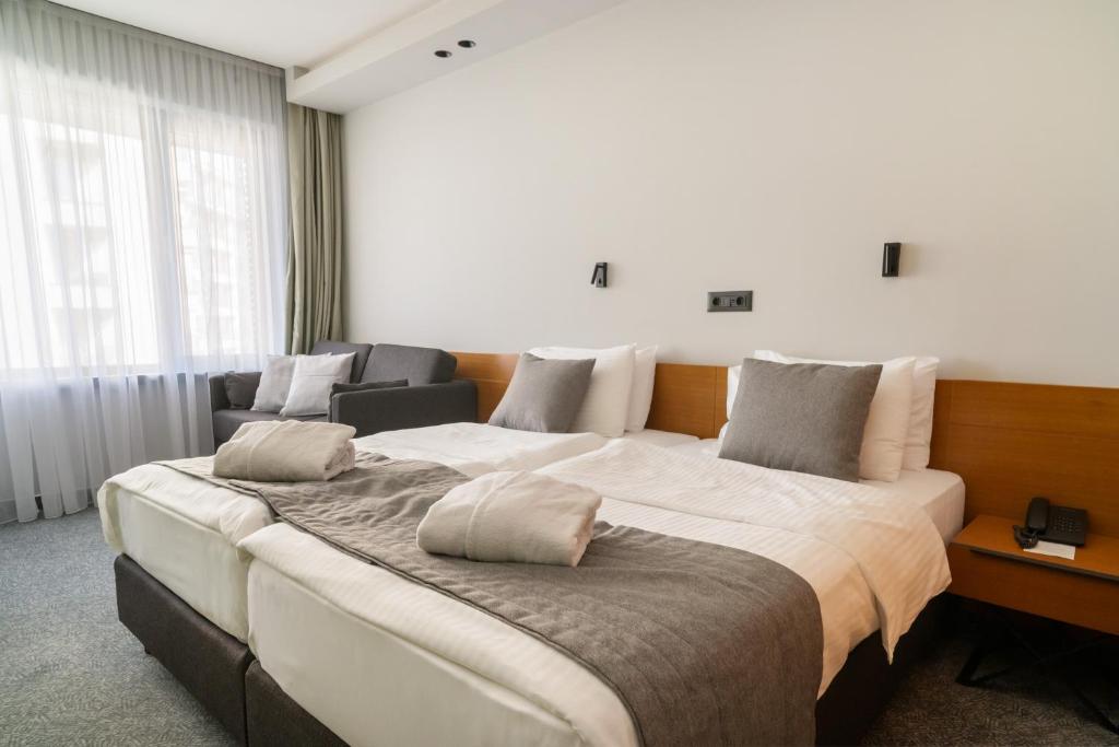 Krevet ili kreveti u jedinici u okviru objekta Mona Plaza Zlatibor