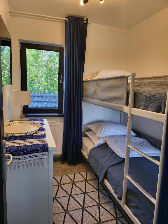 Postel nebo postele na pokoji v ubytování Pensiunea Casa Dacilor