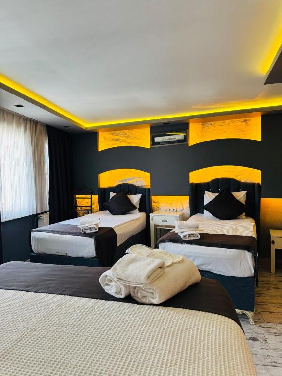 Postel nebo postele na pokoji v ubytování elisa hotel