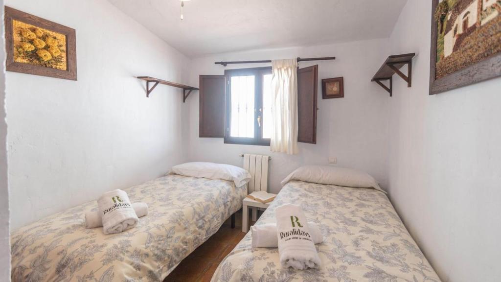 Postel nebo postele na pokoji v ubytování La Viña del Pájaro Casabermeja by Ruralidays