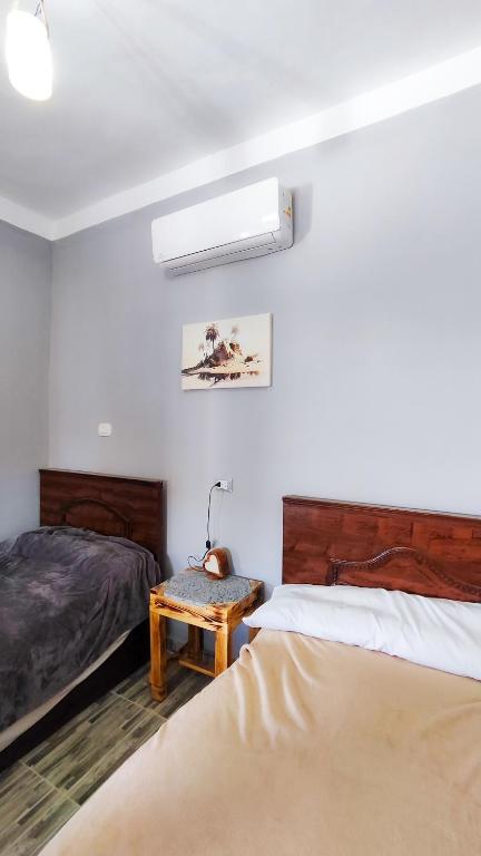 Postel nebo postele na pokoji v ubytování Laila's Home