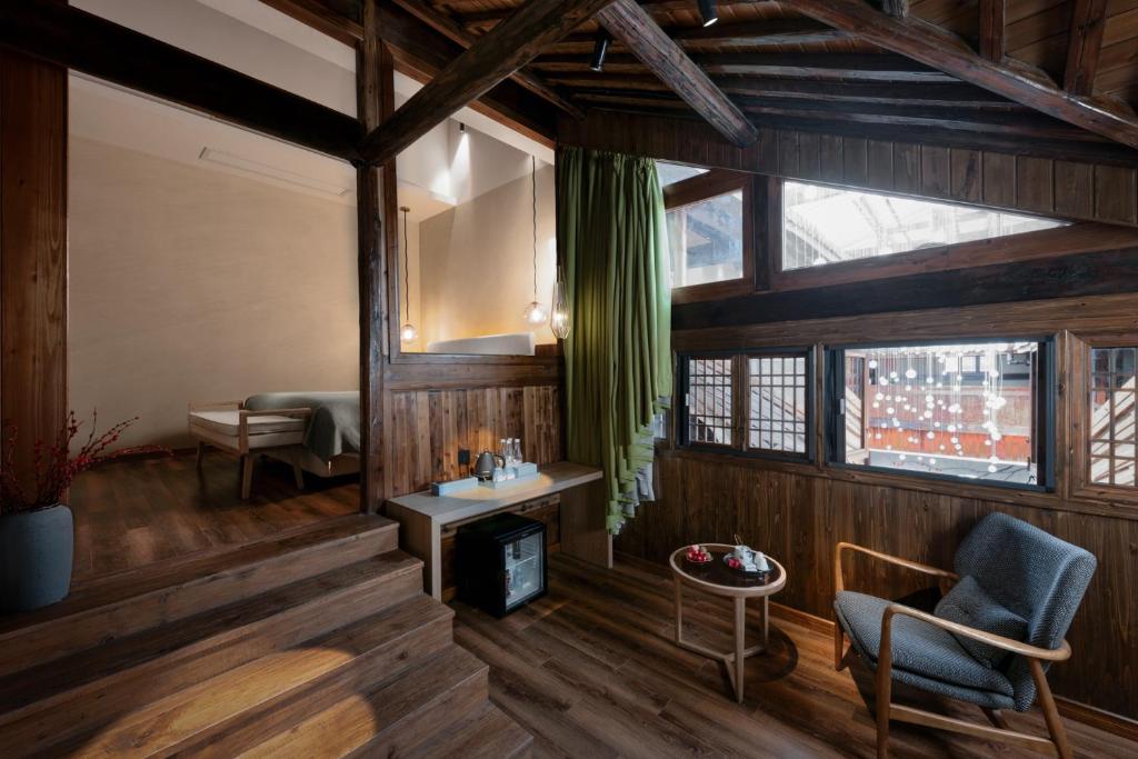 Posezení v ubytování Hidden Moisture and Return to Simplicity Homestay in Mount Huangshan