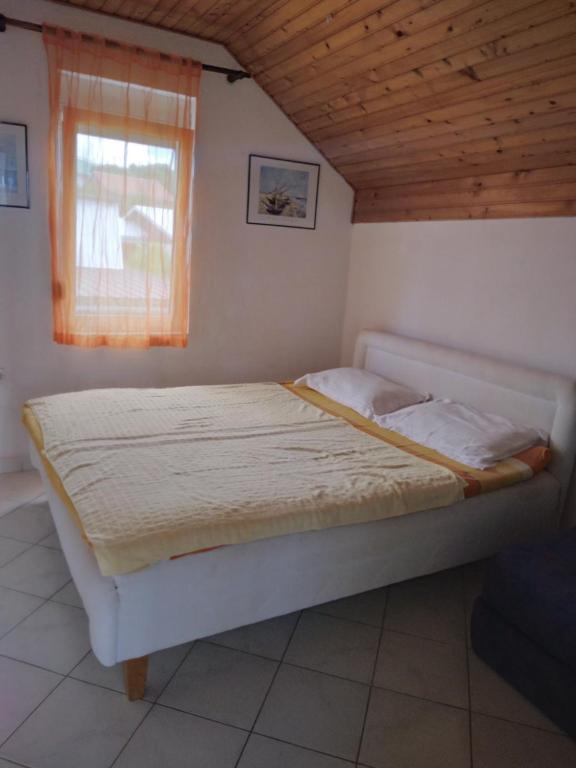 Postel nebo postele na pokoji v ubytování Apartman Dane