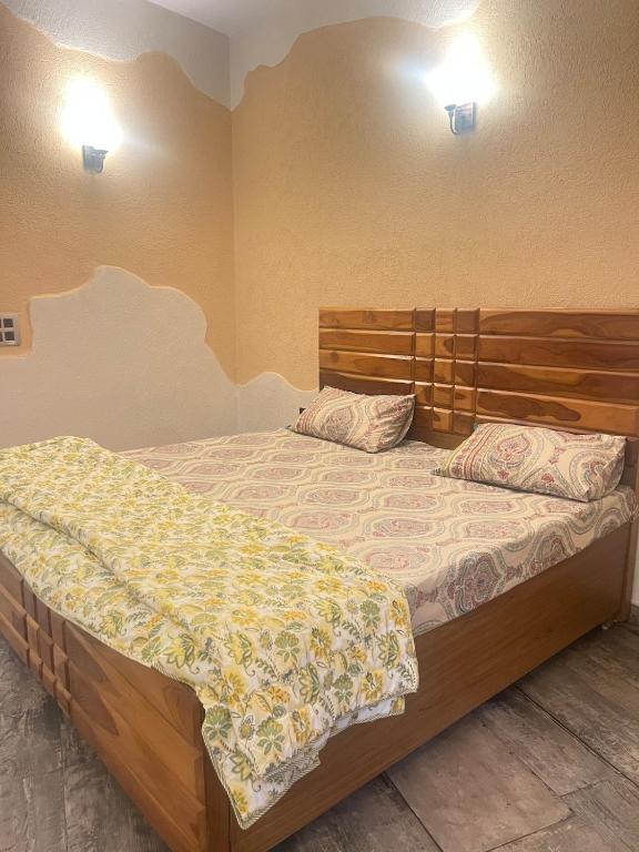 Postel nebo postele na pokoji v ubytování Mati by Jain Farms
