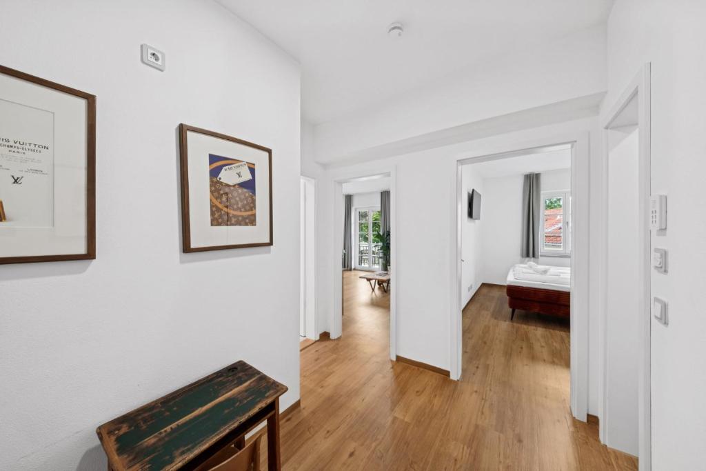 Postel nebo postele na pokoji v ubytování Vaicun Stays LUXURY APARTMENTS - Stilvolle Apartments am Tegernsee