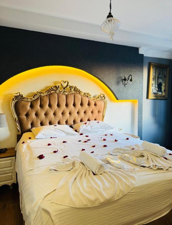 Postel nebo postele na pokoji v ubytování elisa hotel